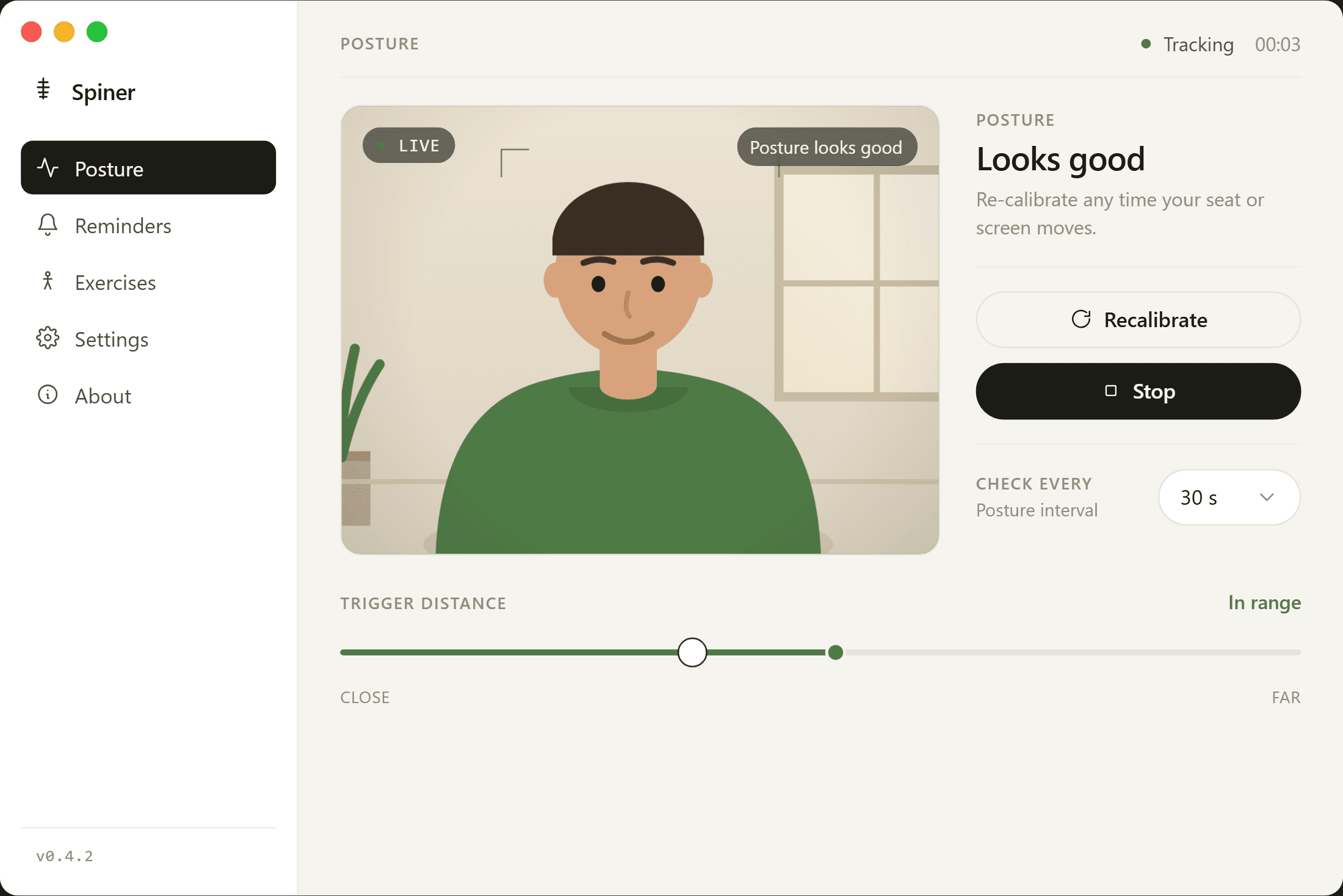The Spiner app showing the live posture monitor with a camera feed, trigger-distance slider and reminder settings